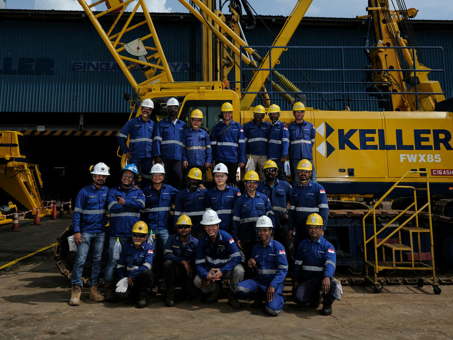 Keller ASEAN employees in front of a Keller rig