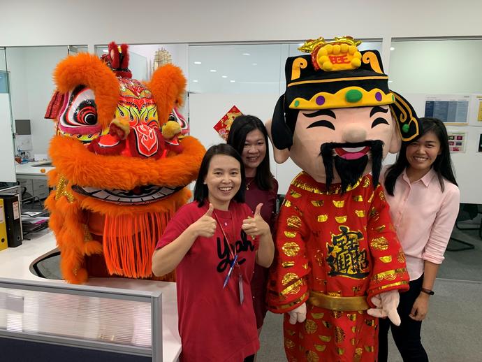 Staff at Keller Singapore office celebrates Chinese New Year with traditional lion dance